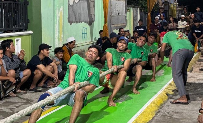 
					Pererat Kebersamaan Antarwarga, Pemuda Desa Ngampel Manyar Gelar Lomba Tarik Tambang Ki Dhemang Cup 1